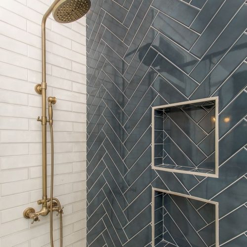 Top End Tiling, Auckland: Detailed view of a modern shower with a professionally installed shower niche.