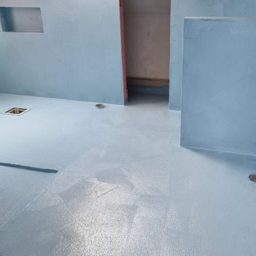waterproofing Auckland, NZ: Waterproofing membrane applied by Top End Tiling, ready for premium tiling installation.