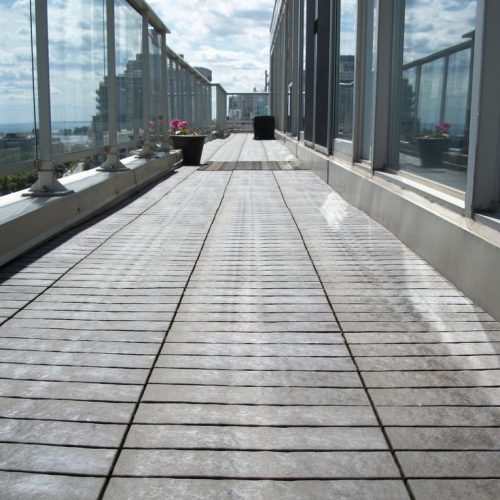 deck jacks Expert outdoor tiling with adjustable deck jacks by Top End Tiling, ensuring perfectly level surfaces in Auckland.