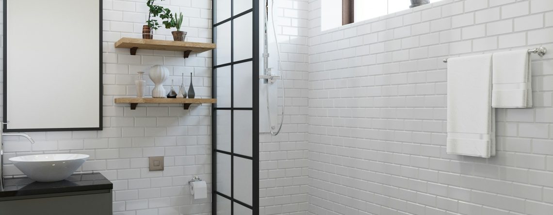 Skilled tilers from Top End Tiling installing white tiles for a stylish and detailed bathroom design.