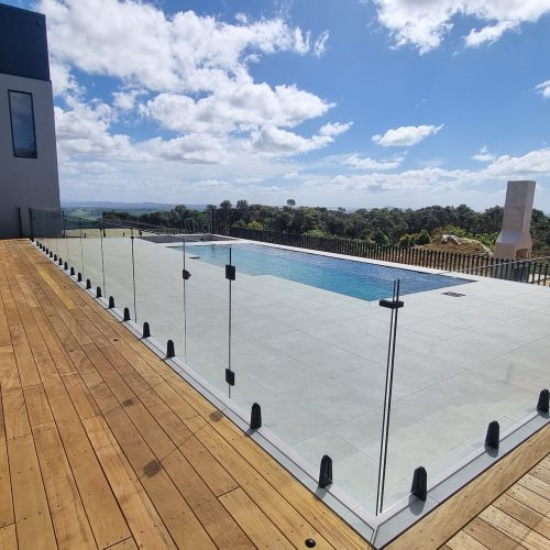 outdoor tiling Top End Tiling: Expert tilers laying elegant pool surrounds at a luxury property in Albany Auckland.